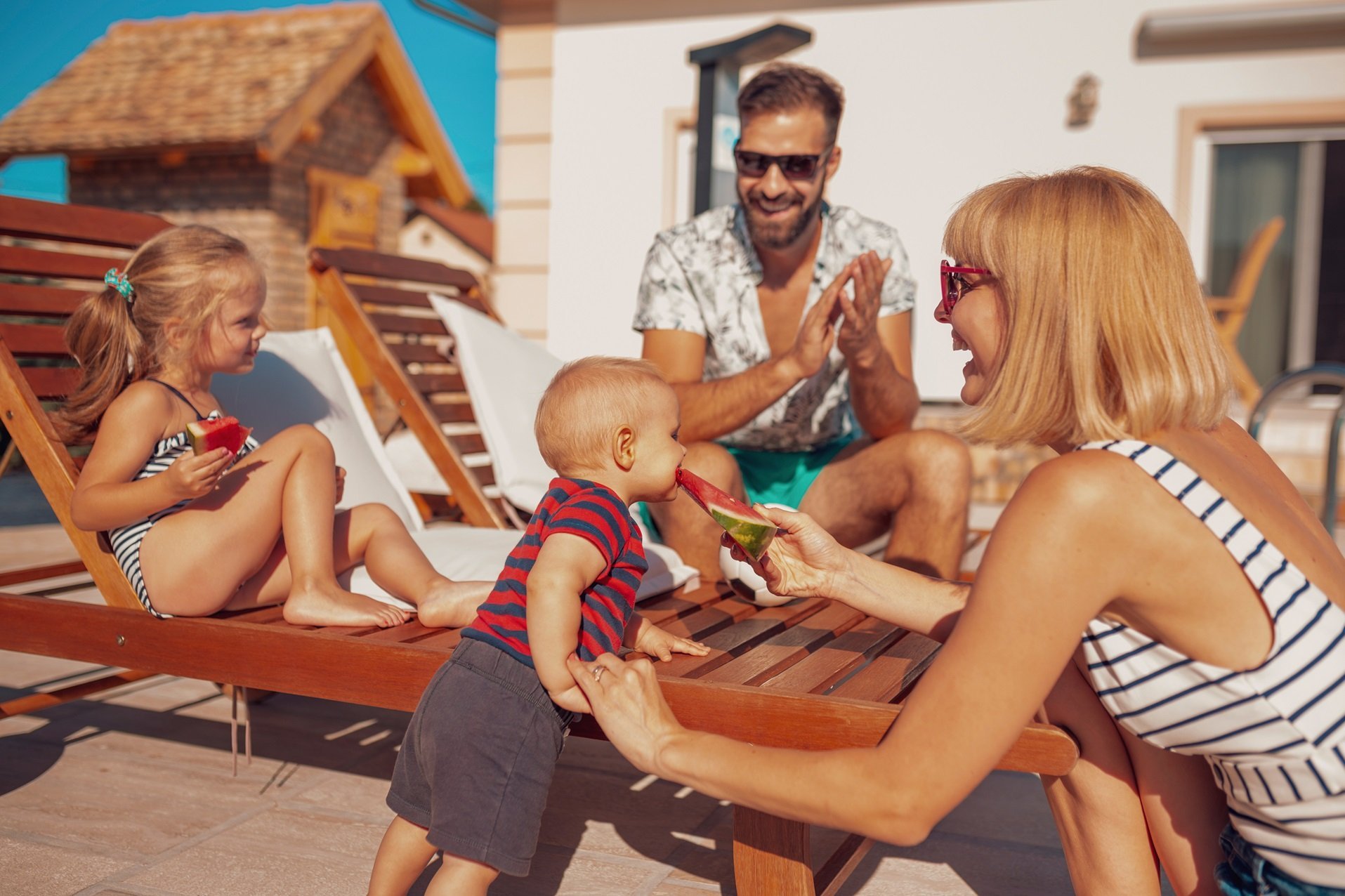 Parents,having,fun,spending,hot,sunny,summer,day,by,the