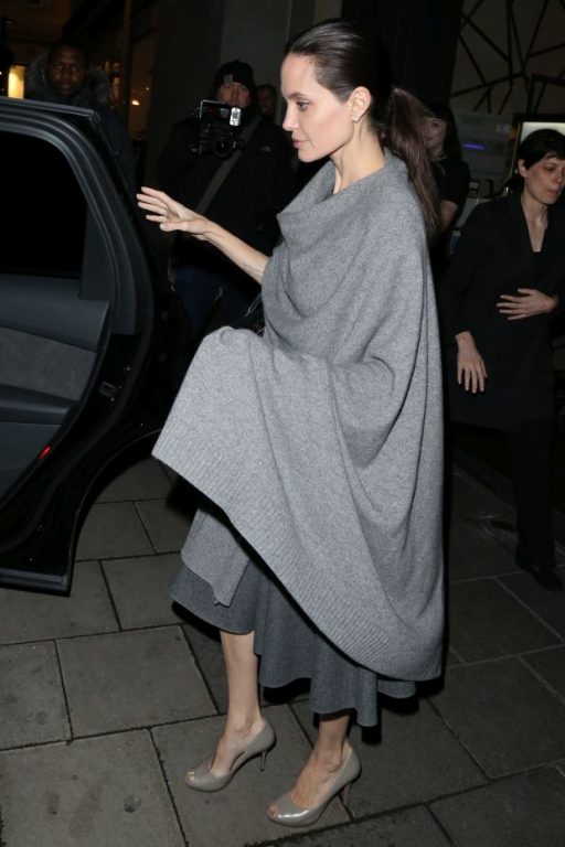 Angelina Jolie pictured leaving Quaglino's Restaurant in Mayfair after dining with William Hague. They had arrived at 8pm and Angelian left via the front exit at 2215 while William Hague slipped away quietly through another doorPictured: Angelina Jol