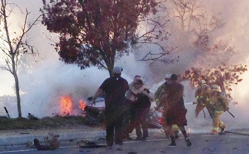 **NO WEB UNTIL 8PM PST DECEMBER 2ND 2013** The dramatic moment the car in which Paul Walker died explodes