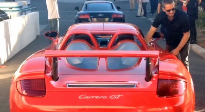 EXCLUSIVE: **PREMIUM RATES APPLY**Paul Walker with the Porsche Carrera GT he was killed in less than half an hour before the tragic crash
