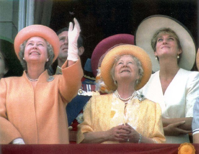 PKT983(B) - 66133 LP3D TROOPING THE COLOUR 1992 Members of the Royal Family watch a flypast by RAF Phantom fighters from the balcony of Buckingham Palace after returning from Horseguards Parade where the Trooping the Colour ceremony took place. L-R The Queen, the Prince of Wales, the Queen Mother and the Princess of Wales. For the Royal Family it was the end of a long, long week. And the watchful glance which Prince Charles gave Princess Diana said it all. Together on the balcony of Buckingham Palace yesterday after the Trooping the Colour they listened to the cheers of the crowds and put on a united front. The Prince and Princess whose marriage has been the subject of such intense speculation- stood with the Queen and the Queen Mother, who smiled happily as thousands paid their tribute. Earlier, the Princess had shared a carriage withthe Queen Mother and a laughing Prince Harry as they drove down the Mall to the ceremony at Horse Guards Parade.