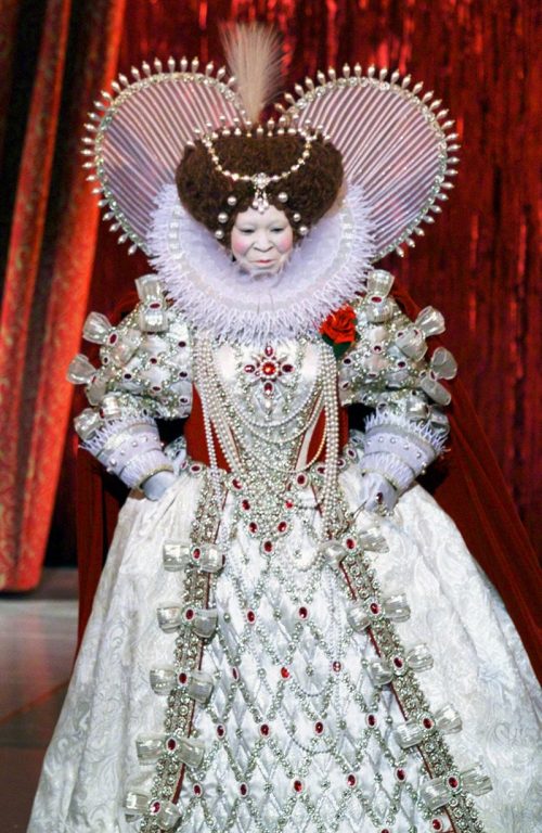 Host Whoopi Goldberg appears as Queen Elizabeth during the 71st Annual Academy Awards at the Dorothy Chandler Pavilion of the Los Angeles Music Center, Sunday, March 21, 1999. The costume, from the private collection of Bob Mackey, sold at auction for $22,800 by Christies Auction House, Tuesday, Nov. 22, 2005, in New York. (AP Photo/Eric Draper)