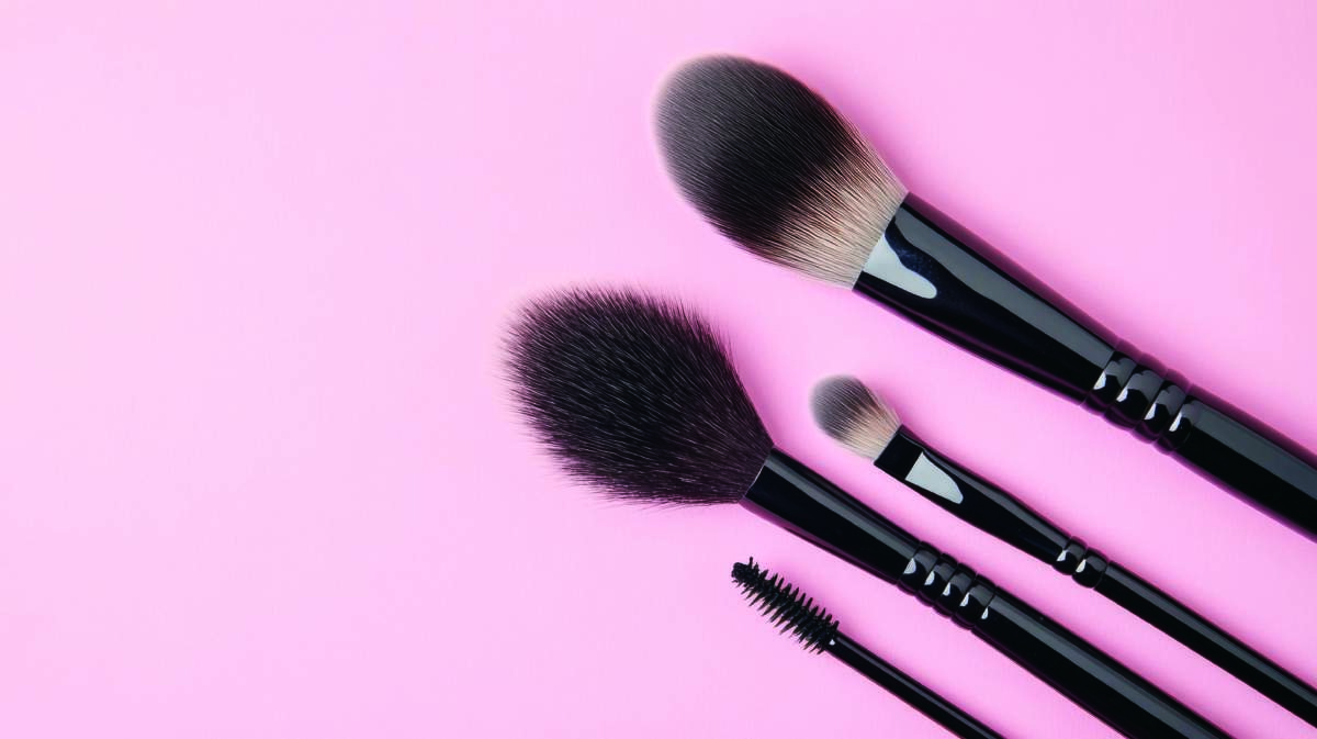 Professional Makeup Brushes Set On A Pink Background Perfect For
