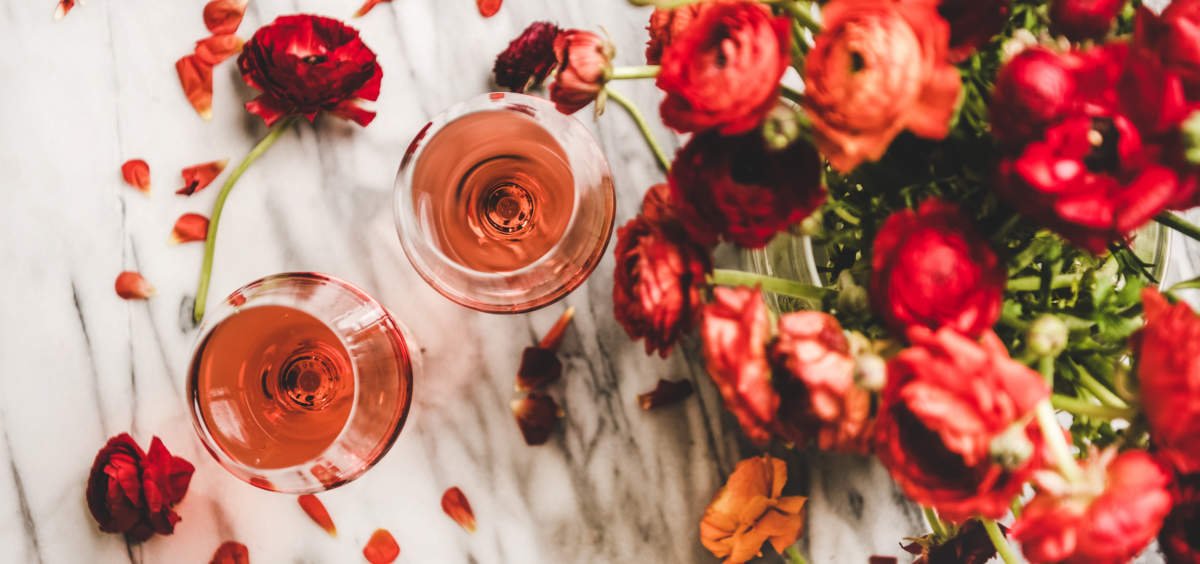 Rose Wine In Glasses And Red Spring Flowers, Wide Composition