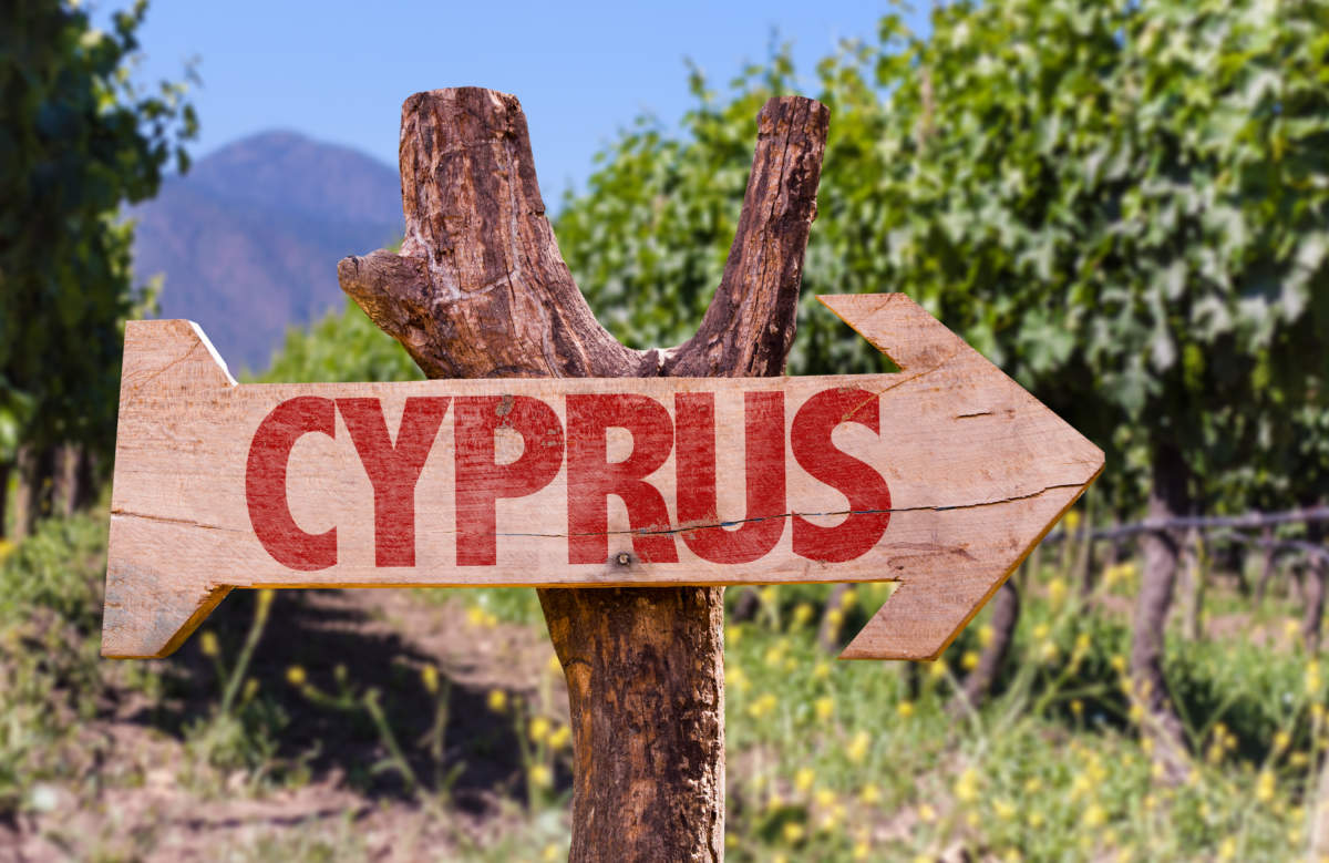 Cyprus Wooden Sign With Winery Background