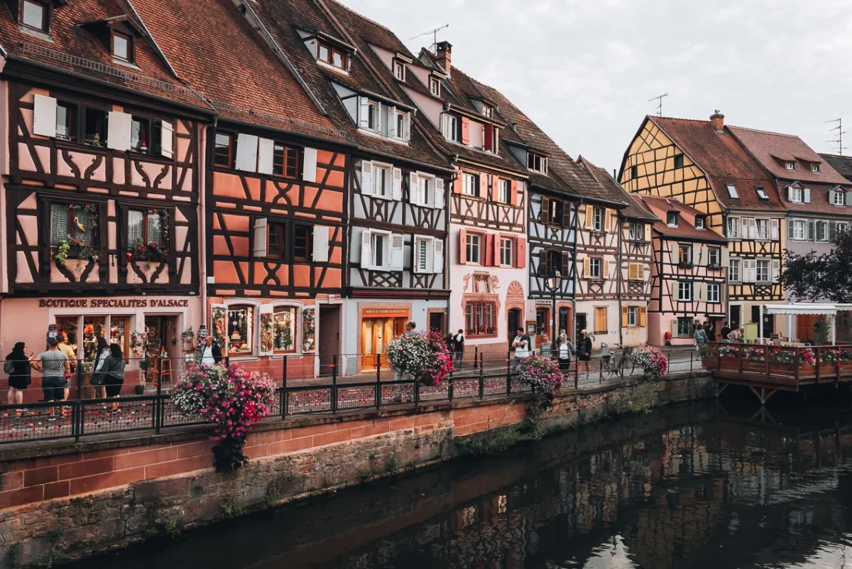 Colorful Half Timbered Houses Along Quai De La Poissonnerie In Colmar