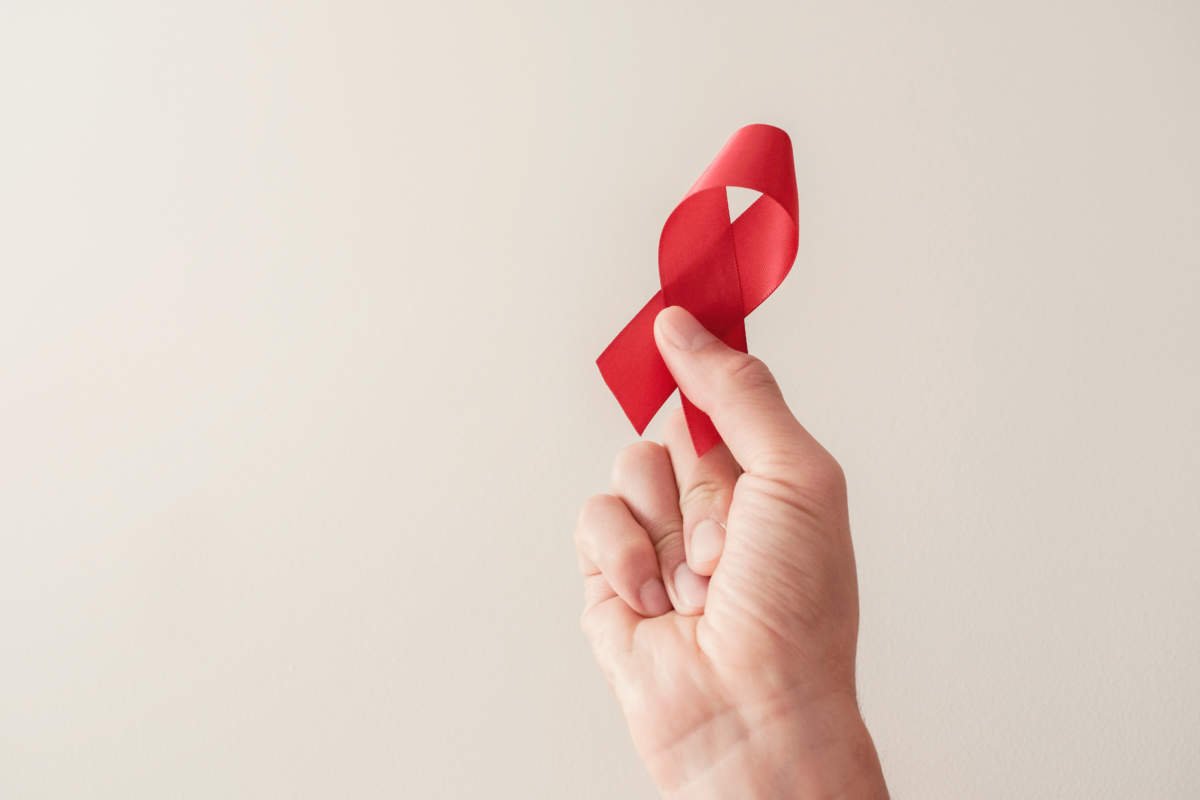 Hand Holding Red Ribbon, Hiv Awareness Concept, World Aids Day, World Hypertension Day