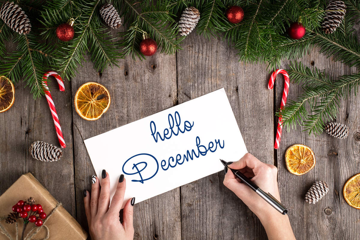 Hello December Hand Lettering Inscription On Wooden Background.