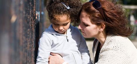 Parent Comforting Child Disaster Diverse
