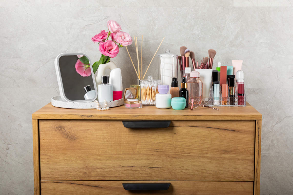 Storage Of Cosmetics On Dressing Tabl.cosmetic Box On The Dresser. Set Of Body Care Cosmetic Products. Decorative And Care Product. Cosmetic Bag. Storage Box. Beauty Concept. Makeup. Space For Text.