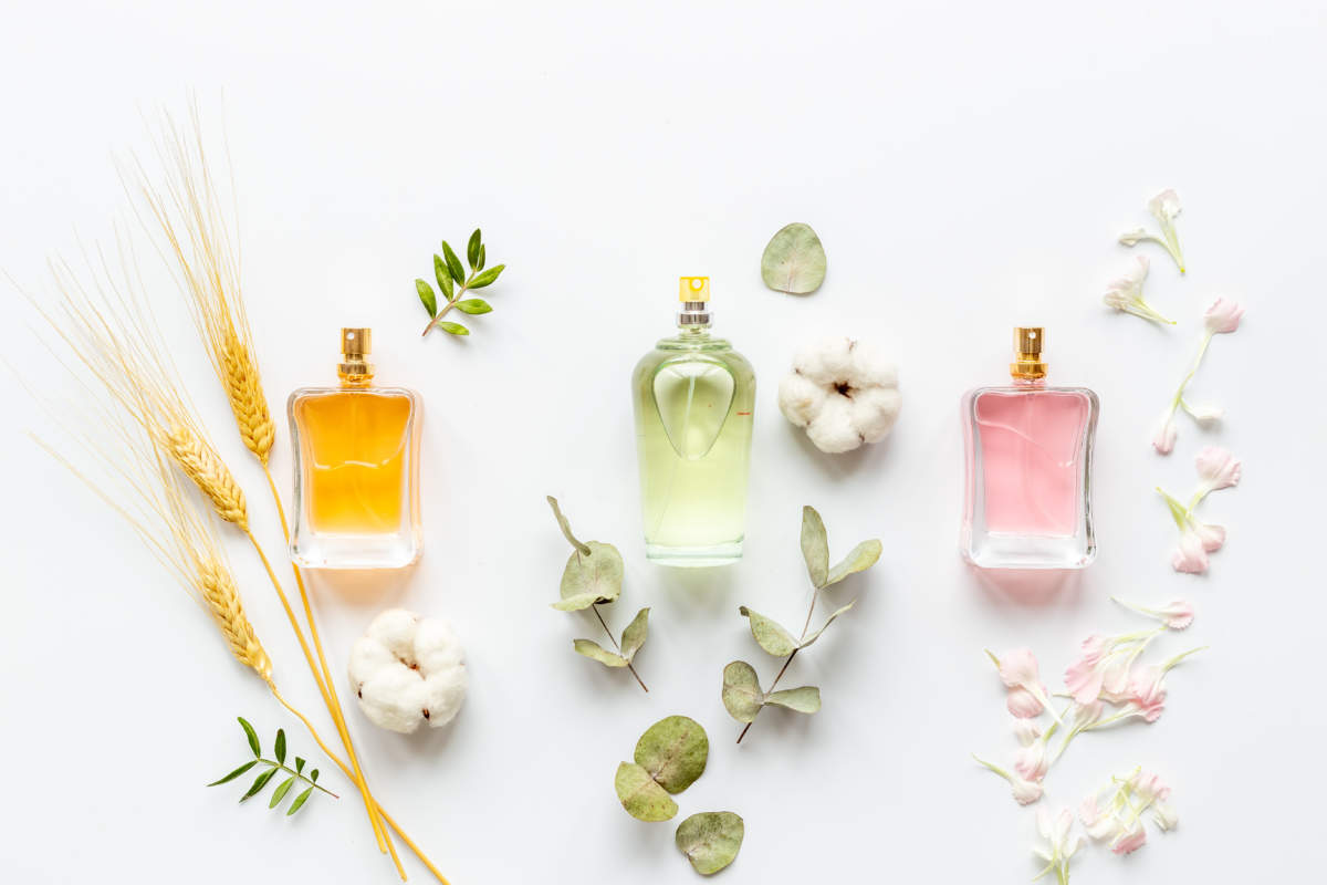 Floral Fragrance Perfume Bottles With Flowers, Top View