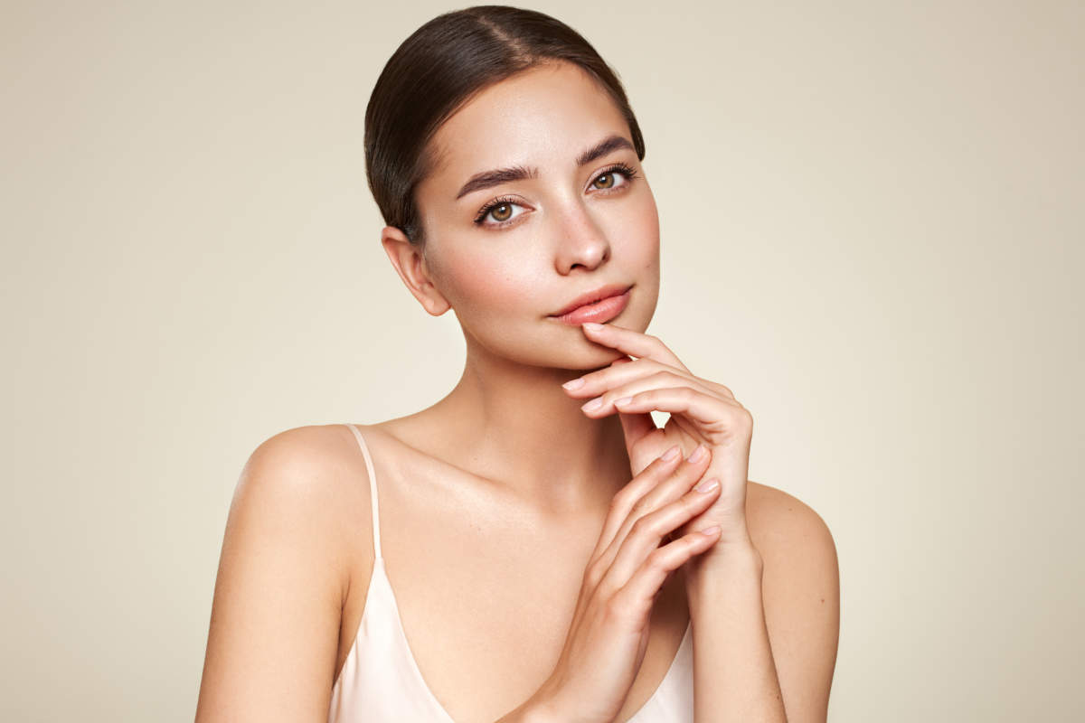 Portrait Beautiful Young Woman With Clean Fresh Skin. Model With Healthy Skin, Close Up Portrait. Cosmetology, Beauty And Spa