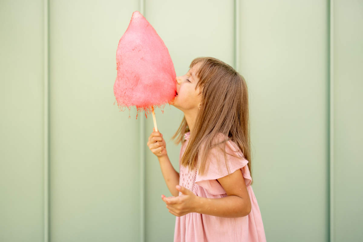 Little Girl With Pink Cotton Candy